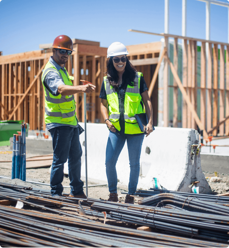 Two SWPPP inspectors collecting data on site using a cloud based software